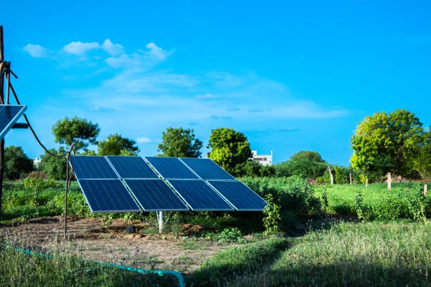 Illustration of a solar-powered water pump in farmland